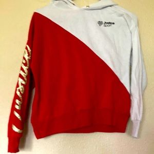 A Justice sport sweatshirt.